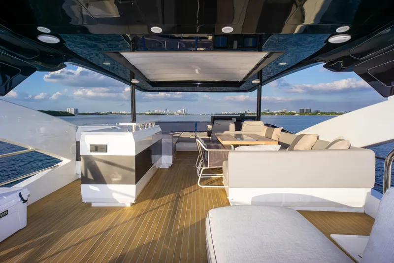  Yacht Photos Pics Luxurious Pearl 80 yacht deck with seating and ocean view, 2020 model.