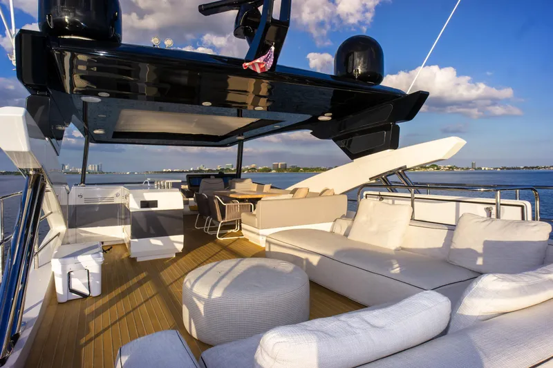  Yacht Photos Pics Luxurious Pearl 80 yacht deck with seating, ocean view, and modern design, 2020 model.