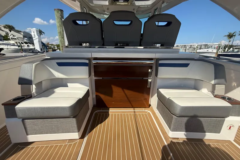  Yacht Photos Pics 2019 Tiara Sport 38 LS boat interior with luxurious seating and modern design.
