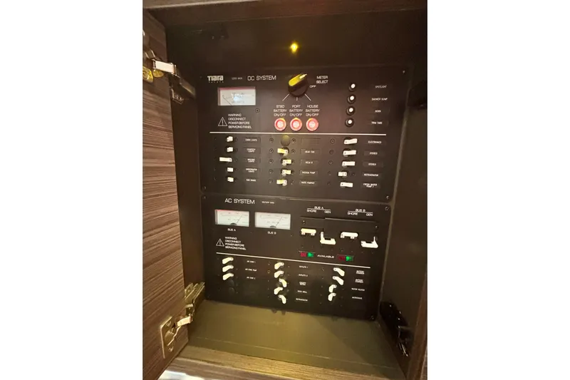  Yacht Photos Pics Electrical control panel of 2019 Tiara Sport 38 LS boat, featuring AC and DC systems.