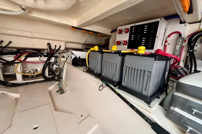  Yacht Photos Pics Engine compartment of 2019 Tiara Sport 38 LS with batteries and wiring.