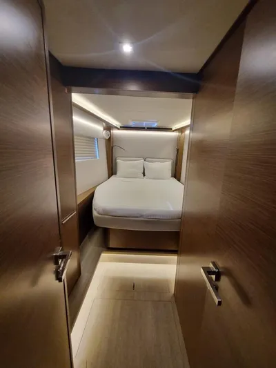  Yacht Photos Pics Interior cabin of 2020 Lagoon 50 yacht with modern design and cozy bed.