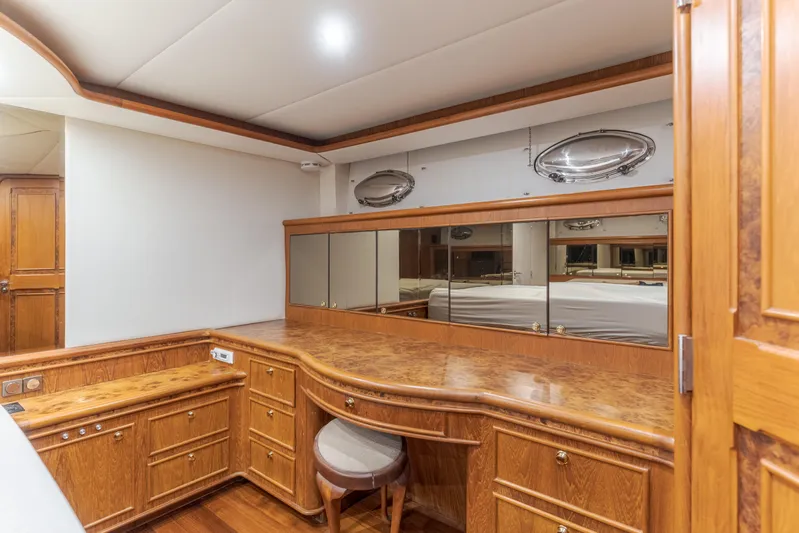 Rising Tide Yacht Photos Pics Luxurious wood interior of 1997 Forbes Cooper Pilothouse yacht with mirrored accents.