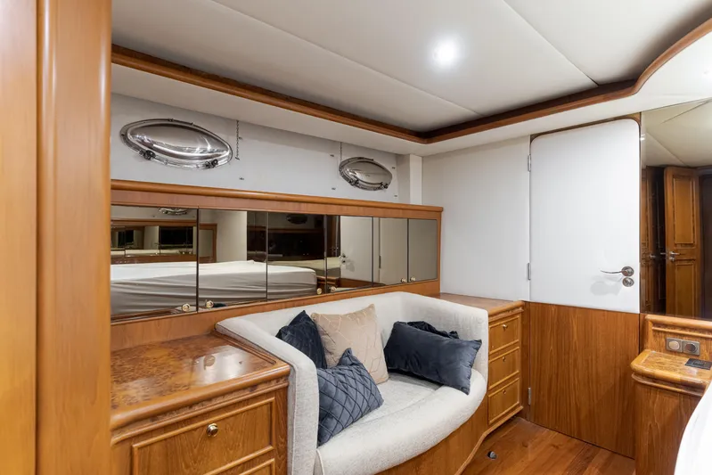 Rising Tide Yacht Photos Pics Luxurious 1997 Forbes Cooper Pilothouse yacht interior with elegant wood finish and cozy seating.