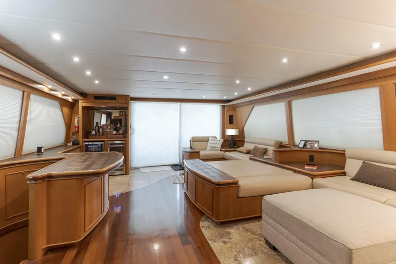 Rising Tide Yacht Photos Pics Luxurious interior of a 1997 Forbes Cooper Pilothouse yacht with elegant wood finishes.