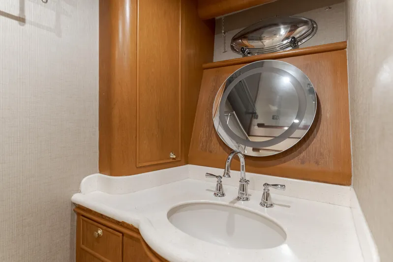 Rising Tide Yacht Photos Pics Luxurious bathroom interior of 1997 Forbes Cooper Pilothouse yacht with elegant fixtures.
