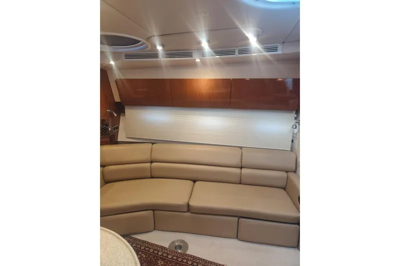  Yacht Photos Pics Luxurious interior of 2007 Regal Commodore 4060 yacht with beige leather seating.