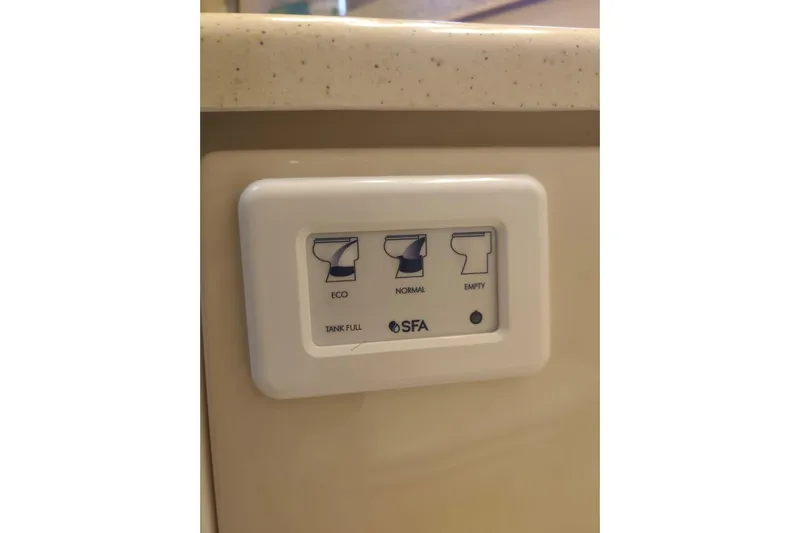  Yacht Photos Pics Control panel on 2007 Regal Commodore 4060 with eco, normal, and empty settings.