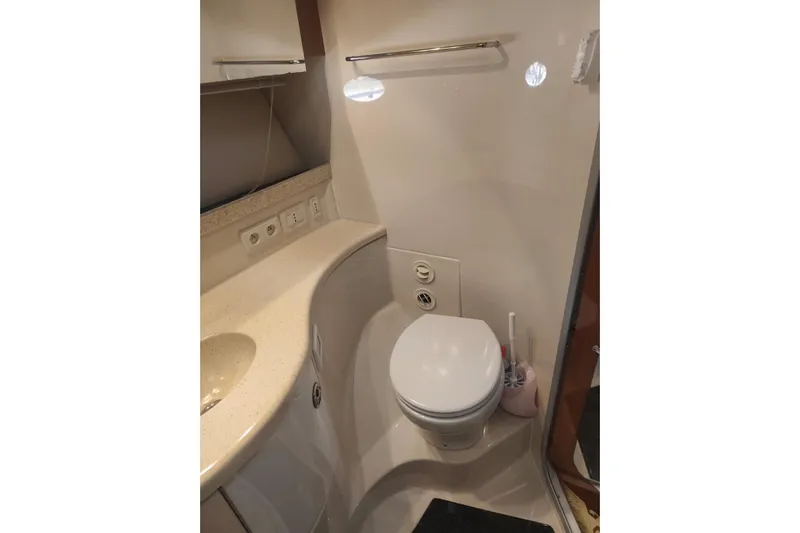  Yacht Photos Pics Bathroom interior of 2007 Regal Commodore 4060 yacht, featuring toilet and sink.