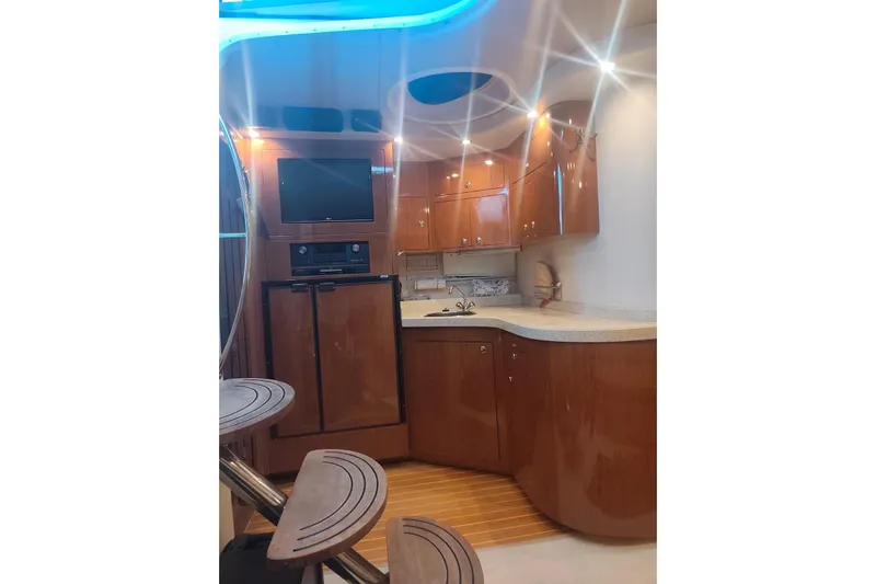  Yacht Photos Pics Luxurious interior of 2007 Regal Commodore 4060 yacht with modern kitchen amenities.