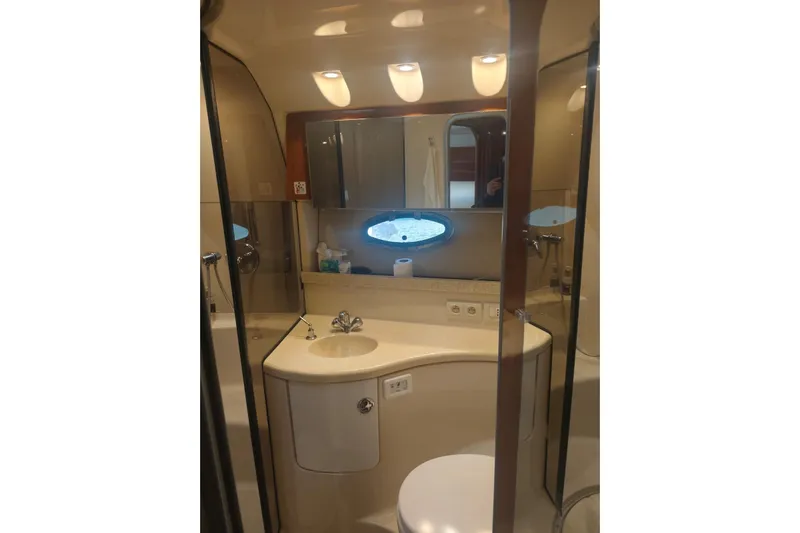  Yacht Photos Pics Luxurious bathroom in 2007 Regal Commodore 4060 yacht with modern fixtures.