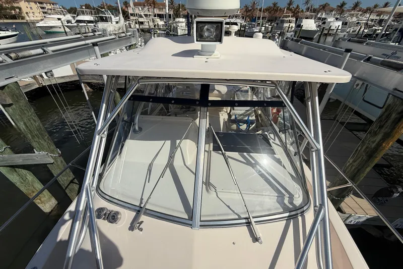  Yacht Photos Pics 2009 Grady-White Marlin 300 boat docked at marina, top view.