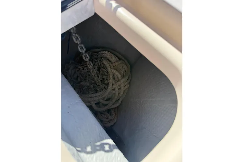  Yacht Photos Pics Anchor chain and rope storage on 2009 Grady-White Marlin 300 boat.