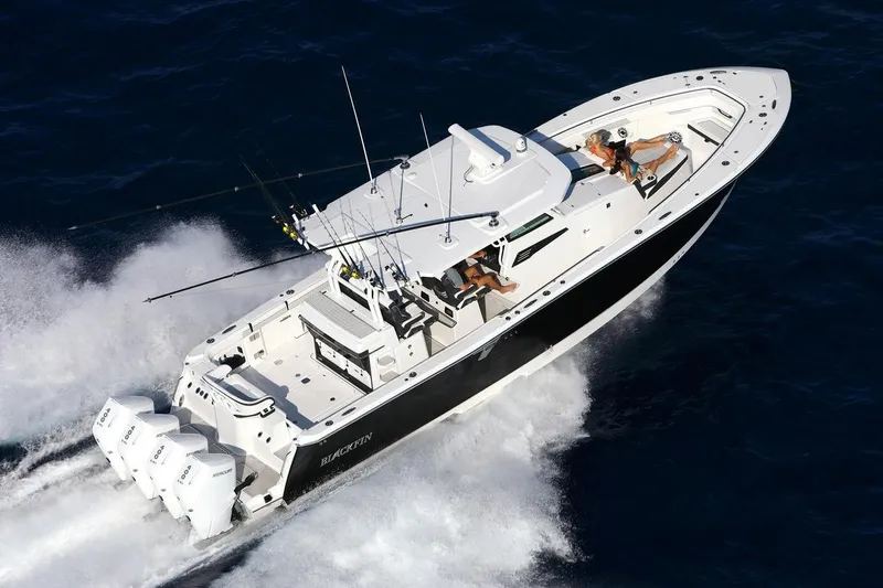  Yacht Photos Pics Manufacturer Provided Image: 2026 Blackfin 400 CC boat cruising on open water with passengers onboard.