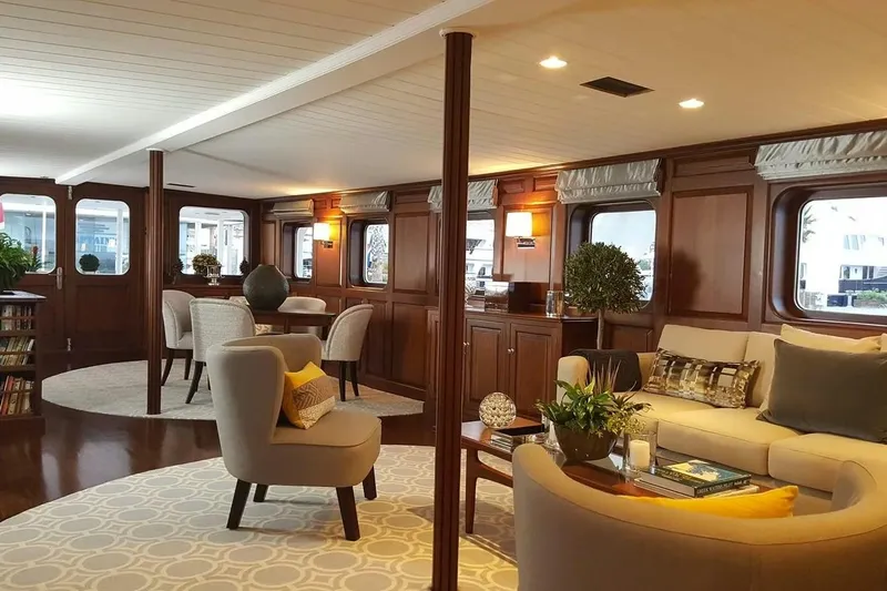  Yacht Photos Pics Luxurious 1975 Custom 39M yacht interior with elegant seating, wooden paneling, and modern decor.