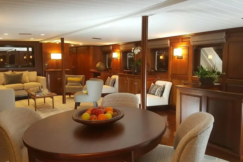  Yacht Photos Pics Luxurious 1975 Custom 39M yacht interior with elegant wood paneling and plush seating.