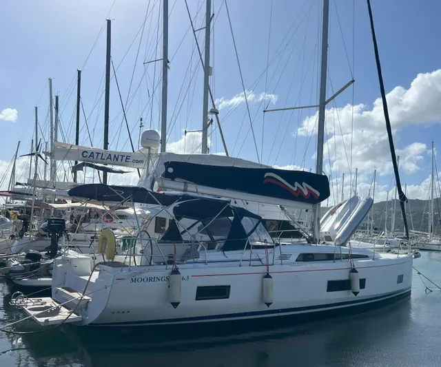 Aita Pea Pea III Yacht Photos Pics 2020 Beneteau Oceanis 46.1 sailboat docked in marina under clear sky.