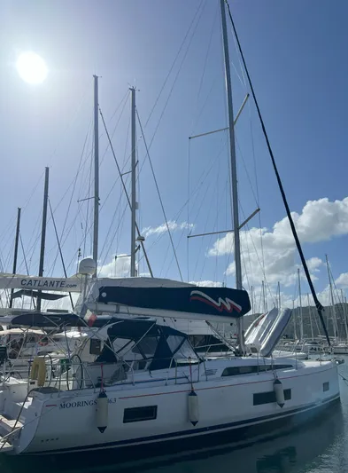 Aita Pea Pea III Yacht Photos Pics 2020 Beneteau Oceanis 46.1 sailboat docked under sunny sky.