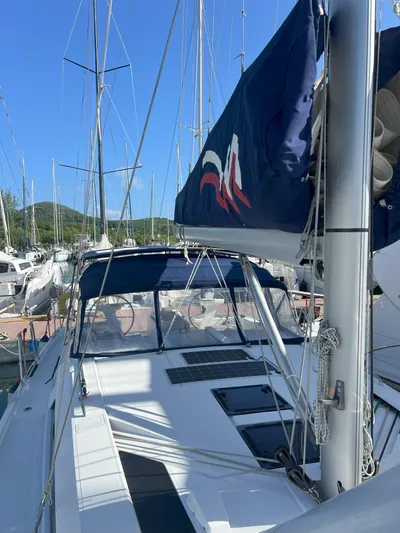 Aita Pea Pea III Yacht Photos Pics 2020 Beneteau Oceanis 46.1 sailboat docked in marina, blue sail cover visible.