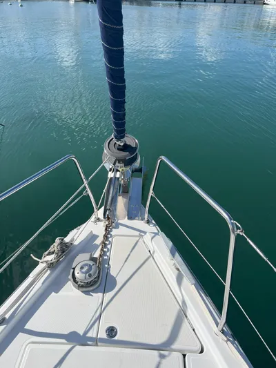Aita Pea Pea III Yacht Photos Pics Bow of 2020 Beneteau Oceanis 46.1 sailboat on calm water.