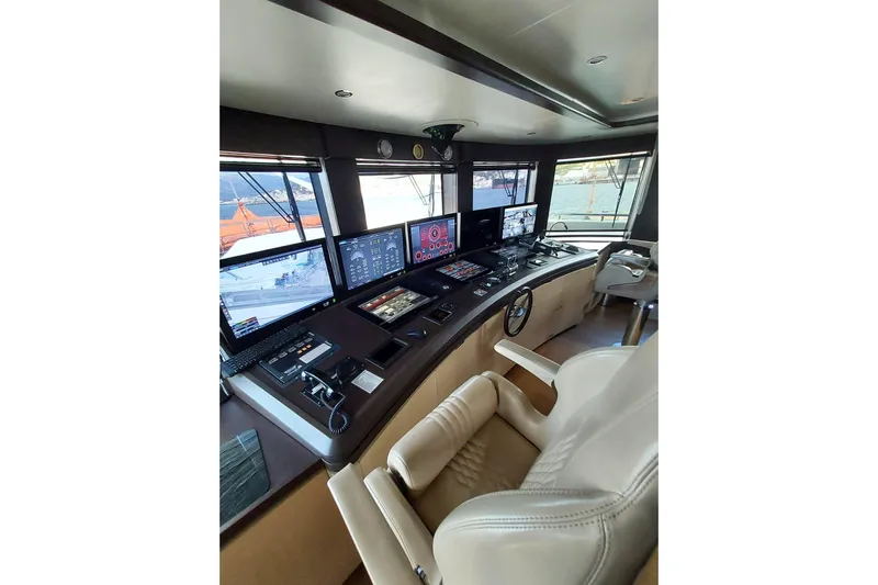  Yacht Photos Pics Luxurious 2022 Benetti B.NOW yacht bridge with advanced navigation systems and plush seating.