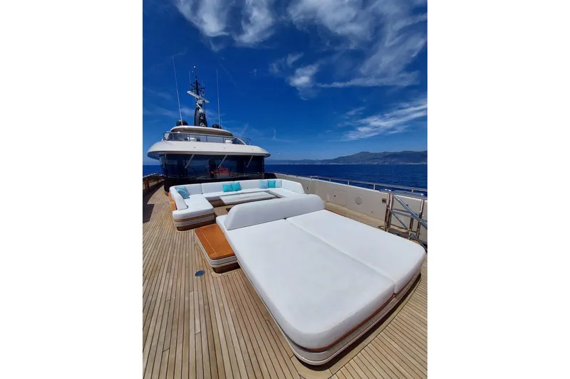 Yacht Photos Pics Luxurious 2022 Benetti B.NOW yacht deck with elegant seating and ocean view.