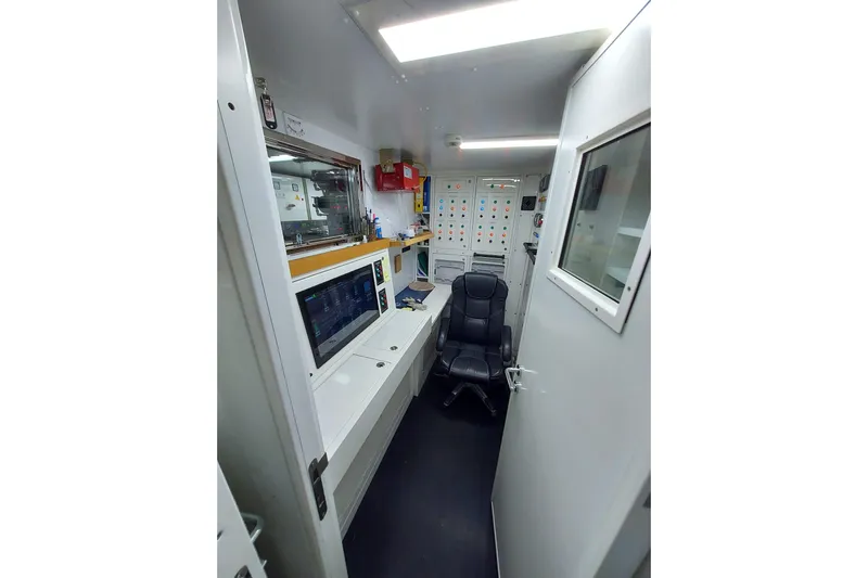  Yacht Photos Pics Control room of 2022 Benetti B.NOW yacht with modern equipment and seating.