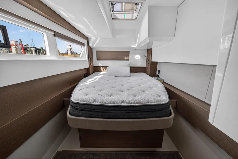  Yacht Photos Pics Luxurious cabin interior of 2025 Leopard 46 yacht with modern design and comfortable bedding.