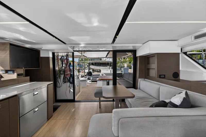  Yacht Photos Pics Modern interior of 2025 Leopard 46 yacht with sleek design and comfortable seating.