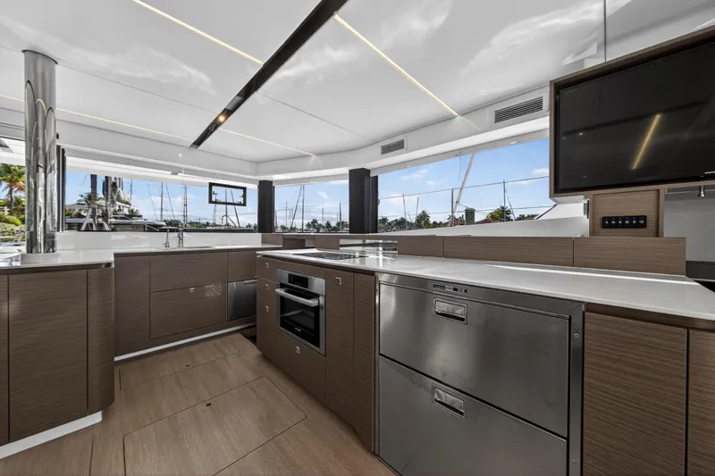  Yacht Photos Pics Modern kitchen interior on 2025 Leopard 46 yacht, featuring sleek design and advanced appliances.
