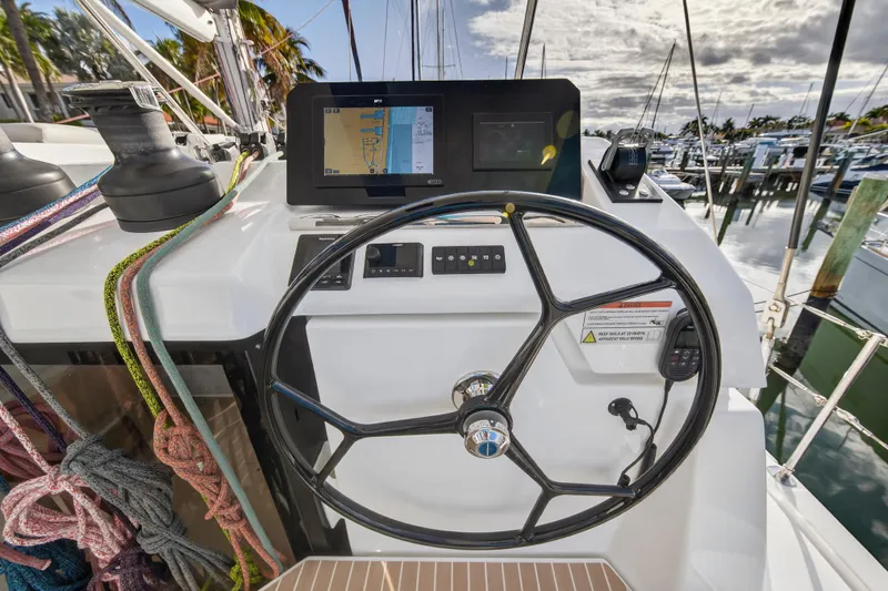  Yacht Photos Pics Steering wheel and navigation system on 2025 Leopard 46 yacht, docked at marina.