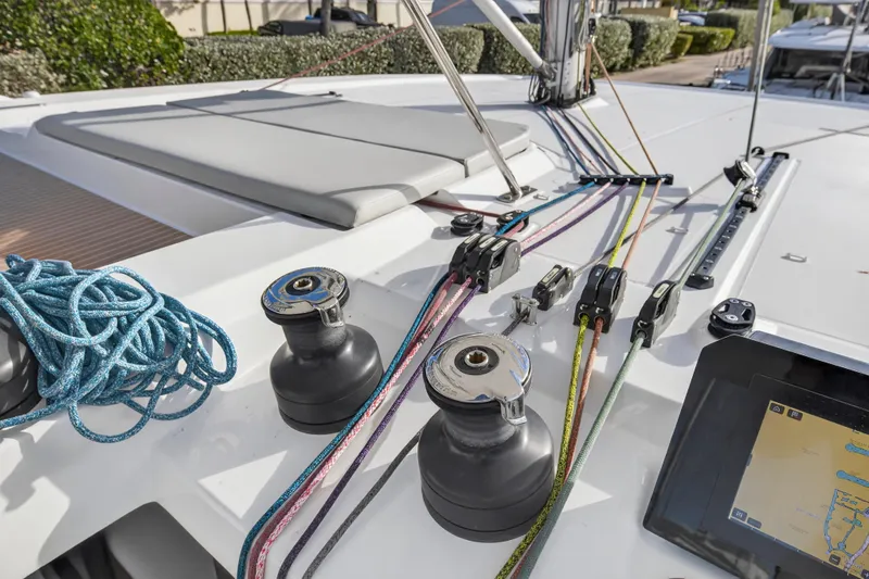  Yacht Photos Pics Deck of 2025 Leopard 46 yacht with winches, ropes, and navigation display.