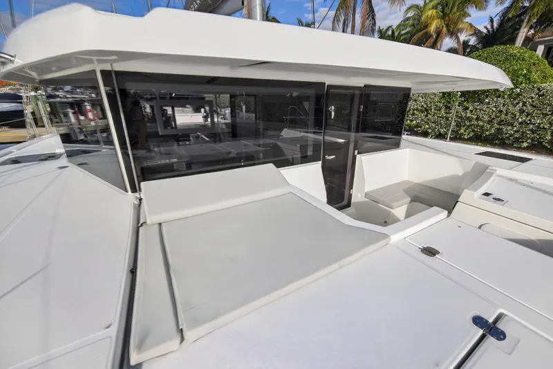  Yacht Photos Pics 2025 Leopard 46 yacht deck with seating and modern design features.