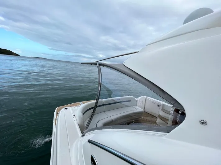  Yacht Photos Pics 2006 Sea Ray 48 Sundancer on calm waters.