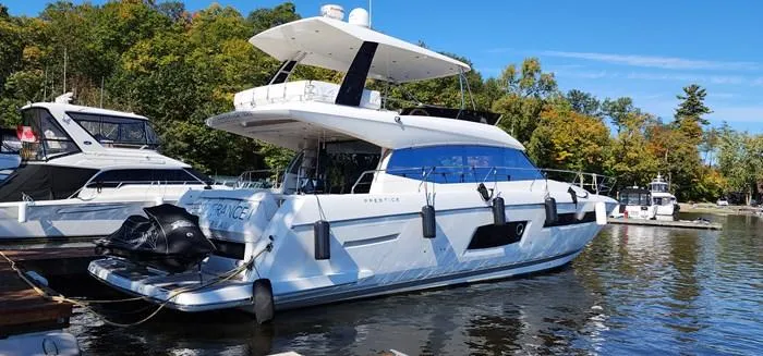  Yacht Photos Pics 2016 Prestige 560 luxury yacht docked in marina.