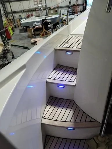  Yacht Photos Pics Illuminated staircase on a 2016 Prestige 560 yacht.