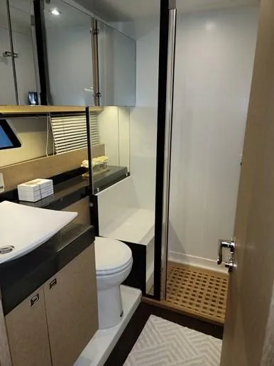  Yacht Photos Pics Luxurious bathroom on a 2016 Prestige 560 yacht.