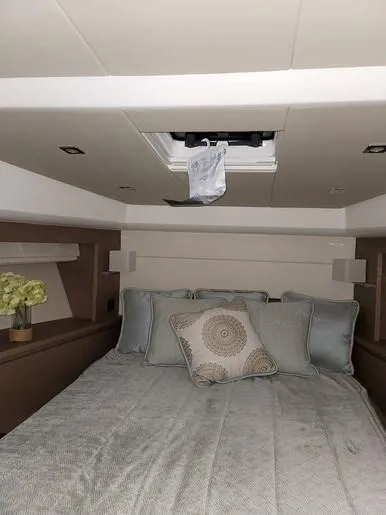  Yacht Photos Pics Luxurious bedroom on a 2016 Prestige 560 yacht.