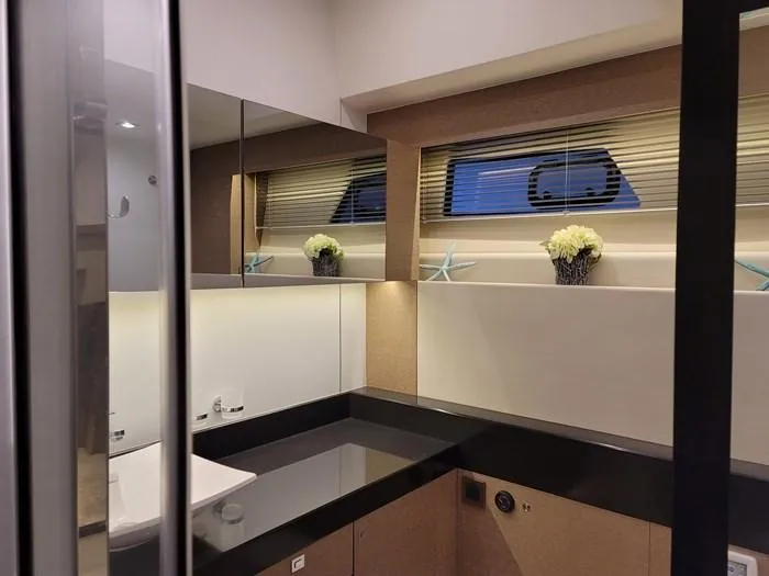  Yacht Photos Pics Luxurious bathroom on a 2016 Prestige 560 yacht.