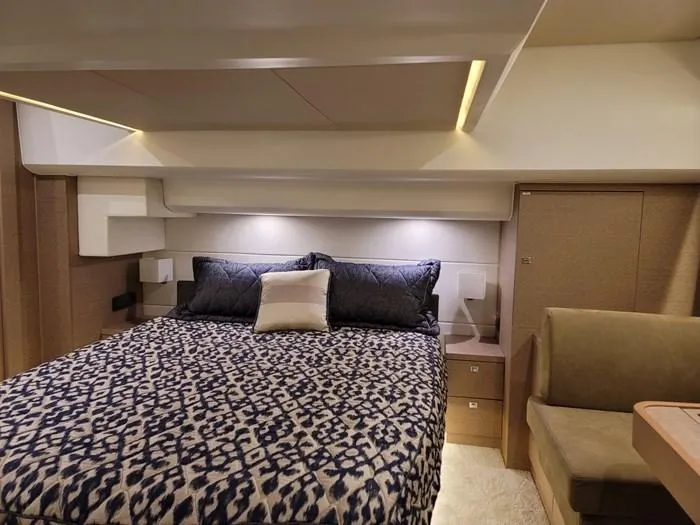 Yacht Photos Pics Luxurious bedroom on a 2016 Prestige 560 yacht.