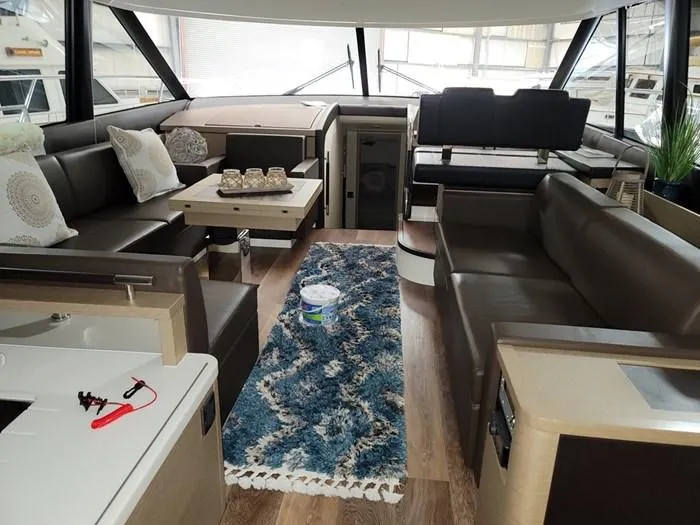  Yacht Photos Pics Interior of a 2016 Prestige 560 yacht with luxurious furnishings.