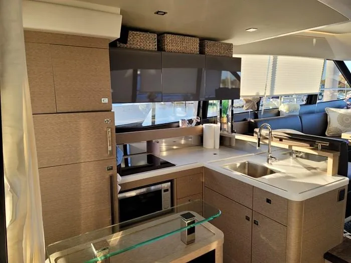  Yacht Photos Pics Modern kitchen on a 2016 Prestige 560 yacht.