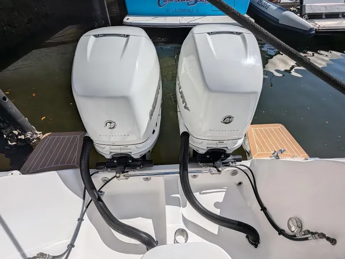  Yacht Photos Pics Twin outboard motors on a 2017 Intrepid 327 Center Console boat.