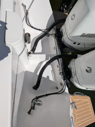  Yacht Photos Pics Intrepid 327 Center Console 2019 with 400HP motors, rear view showing engine connections.