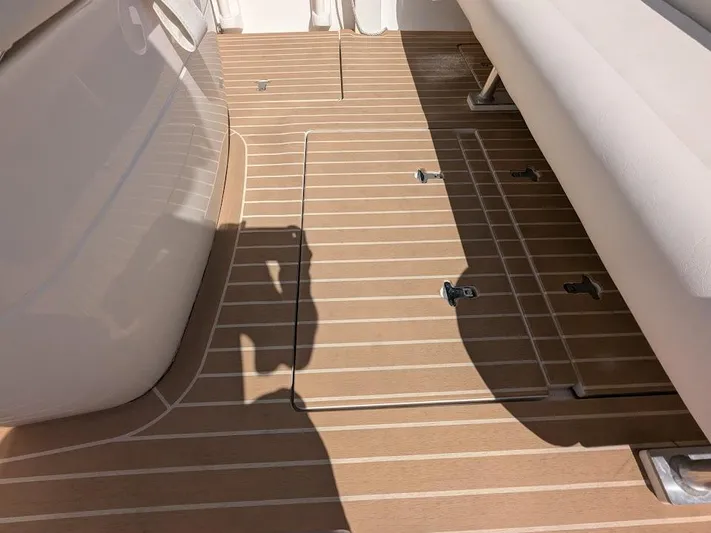  Yacht Photos Pics Teak deck of 2017 Intrepid 327 Center Console boat, showcasing clean lines and modern design.