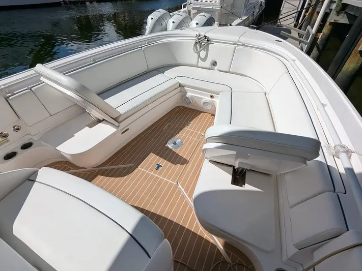  Yacht Photos Pics Luxurious Intrepid 327 Center Console boat interior with spacious seating, 2019 model.