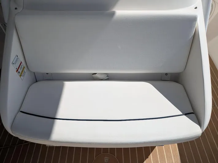  Yacht Photos Pics White cushioned seat on Intrepid 327 Center Console boat, 2017 model.