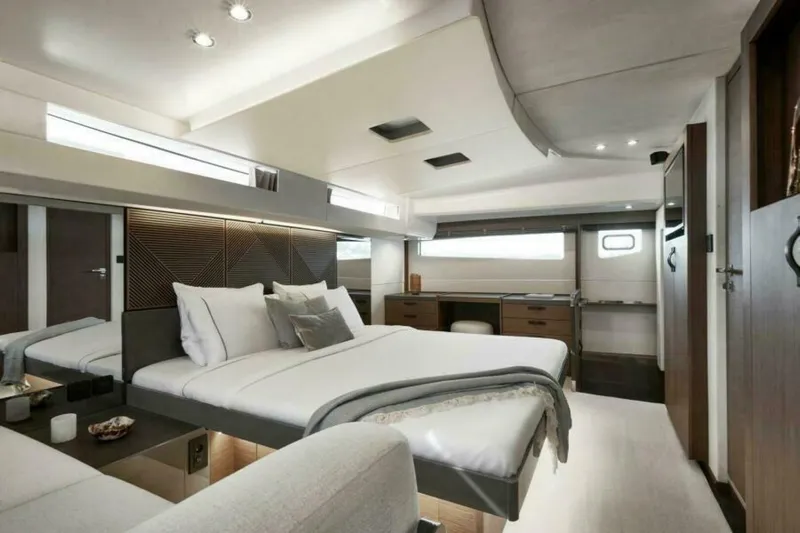 New 2026 Prestige M48 Multihull Yacht Photos Pics Luxurious interior of 2026 Prestige M48 yacht with modern bedroom design.
