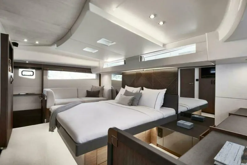 New 2026 Prestige M48 Multihull Yacht Photos Pics Luxurious interior of 2026 Prestige M48 yacht with modern bedroom design.