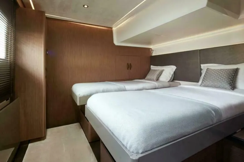 New 2026 Prestige M48 Multihull Yacht Photos Pics Luxurious twin cabin interior of 2026 Prestige M48 yacht with modern design.